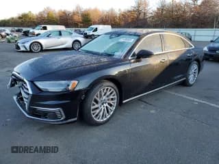 ✅ 2021 Audi A8 • VIN: WAU8HAF86MN019320 • Лот: 81498583. Опубликован ранее на Copart с пробегом Не указан. Бесплатный доступ к архиву аукционных продаж из США и подробный отчёт об истории автомобиля на DreamBid. Изображение 1.