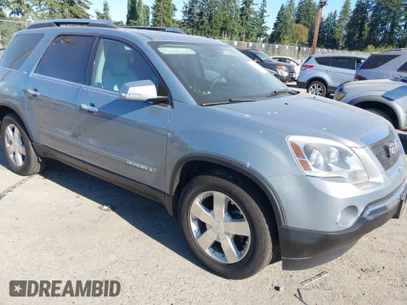 ✅ 2007 GMC Acadia SLT • VIN: 1GKEV23727J165357 • Lot: 42950913. Wystawiony na IAAI z przebiegiem 63 553 mil. Bezpłatny archiwum sprzedaży aukcyjnych z USA i szczegółowy raport historii pojazdu na DreamBid. Zdjęcie 1.