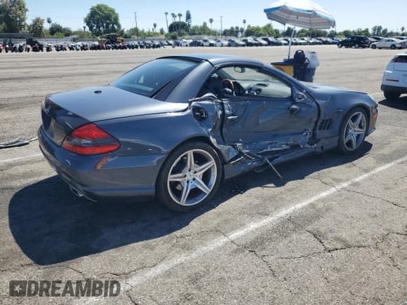 ✅ 2009 Mercedes-Benz SL 550 • VIN: WDBSK71FX9F153489 • Lot: 67270335. Listed on Copart with 93,419 mi. Free auction sales archive from the USA and detailed vehicle history report at DreamBid. Image 3.