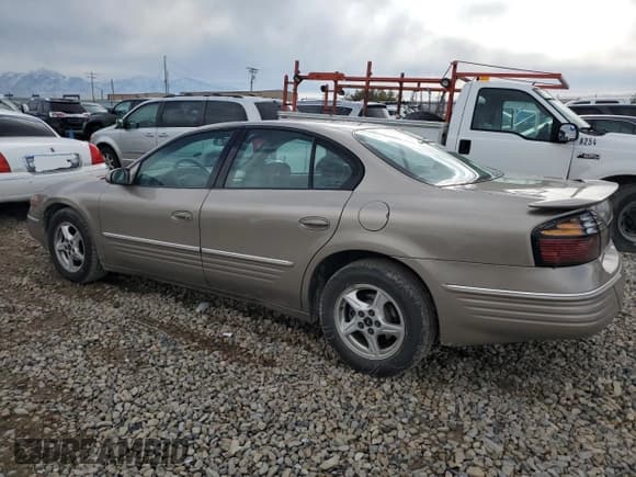 ✅ 2001 Pontiac Bonneville SE • VIN: 1G2HX54K514246161 • Lot: 80767114. Listed on Copart with 119,548 mi. Free auction sales archive from the USA and detailed vehicle history report at DreamBid. Image 2.