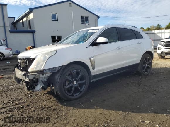 ✅ 2013 Cadillac SRX Premium Collection • VIN: 3GYFNEE32DS533844 • Lot: 86280585. Wystawiony na Copart z przebiegiem 115 438 mil. Bezpłatny archiwum sprzedaży aukcyjnych z USA i szczegółowy raport historii pojazdu na DreamBid. Zdjęcie 1.