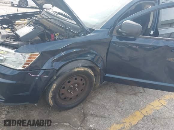 2015 Dodge Journey American Value z VIN 3C4PDCABXFT610861, wystawiony jako IAAI lot #43068421 z przebiegiem 153 937 mil mil oraz . Historia ofert i sprzedaży dostępna na DreamBid. Obrazek 6.