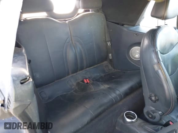 ✅ 2005 MINI Convertible S • VIN: WMWRH33475TF82636 • Lot: 43261691. Listed on IAAI with 127,918 mi. Free auction sales archive from the USA and detailed vehicle history report at DreamBid. Image 8.