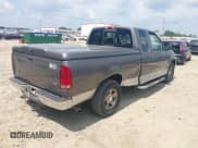 ✅ 2002 Ford F-150 XL • VIN: 1FTRX17W12NA04051 • Lot: 43027436. Listed on IAAI with 495,588 mi. Free auction sales archive from the USA and detailed vehicle history report at DreamBid. Image 4.