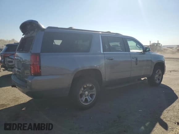 ✅ 2020 Chevrolet Suburban LT • VIN: 1GNSKHKC2LR114078 • Lot: 77198034. Listed on Copart with 113,731 mi. Free auction sales archive from the USA and detailed vehicle history report at DreamBid. Image 3.