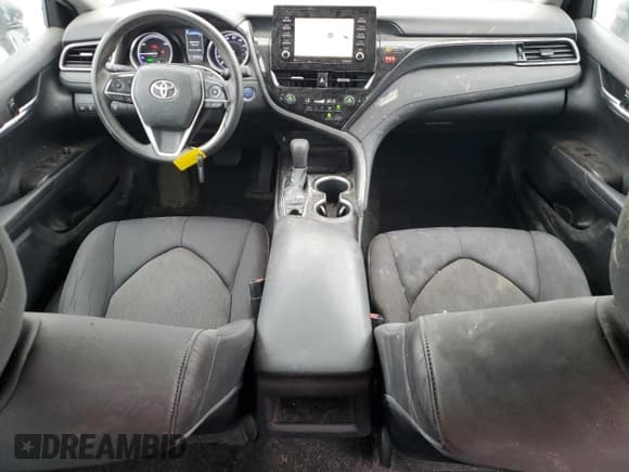 ✅ 2022 Toyota Camry Hybrid LE • VIN: 4T1C31AK1NU578193 • Lot: 86097195. Wystawiony na Copart z przebiegiem 80 765 mil. Bezpłatny archiwum sprzedaży aukcyjnych z USA i szczegółowy raport historii pojazdu na DreamBid. Zdjęcie 8.