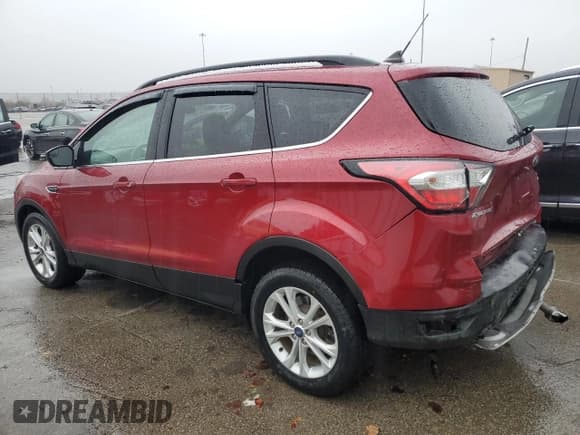✅ 2018 Ford Escape SE • VIN: 1FMCU0GD5JUC29564 • Lot: 93534775. Listed on Copart with 47,112 mi. Free auction sales archive from the USA and detailed vehicle history report at DreamBid. Image 2.