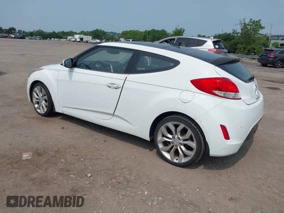 2012 Hyundai Veloster w/Gray Int with VIN KMHTC6AD3CU051395, listed as a IAAI auction lot 42489038 with 153,319 mi miles and . Bid and sale history available at DreamBid. Image 3.