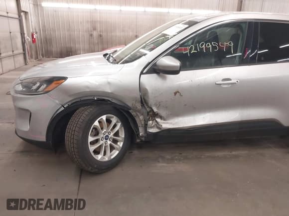 ✅ 2020 Ford Escape SE • VIN: 1FMCU9G63LUA56720 • Lot: 42199549. Listed on IAAI with 57,944 mi. Free auction sales archive from the USA and detailed vehicle history report at DreamBid. Image 6.