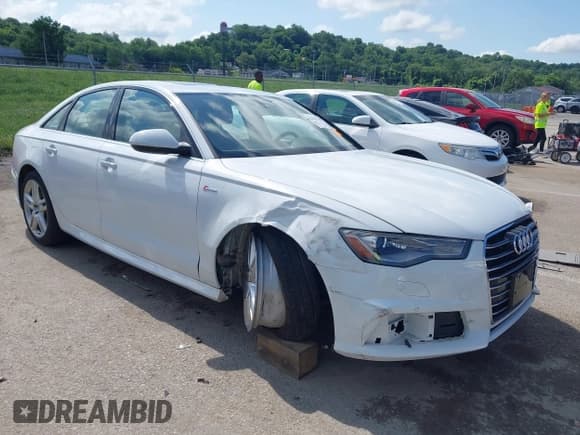 ✅ 2016 Audi A6 Premium Plus • VIN: WAUFGAFC3GN123217 • Lot: 42527706. Wystawiony na IAAI z przebiegiem 121 034 mil. Bezpłatny archiwum sprzedaży aukcyjnych z USA i szczegółowy raport historii pojazdu na DreamBid. Zdjęcie 1.