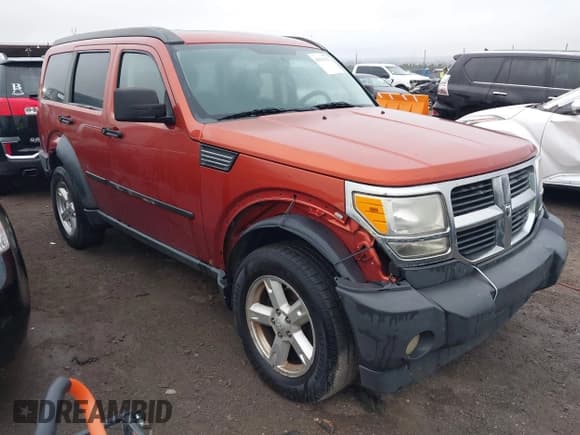 ✅ 2007 Dodge Nitro SXT • VIN: 1D8GU28K17W601446 • Lot: 41014232. Wystawiony na IAAI z przebiegiem 213 935 mil. Bezpłatny archiwum sprzedaży aukcyjnych z USA i szczegółowy raport historii pojazdu na DreamBid. Zdjęcie 1.