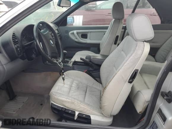 1998 BMW 3 Series 323i z VIN WBABJ7328WEA17071, wystawiony jako Copart lot #75089004 z przebiegiem Nie podano mil oraz Nie do naprawy • Non repairable. Historia ofert i sprzedaży dostępna na DreamBid. Obrazek 7.