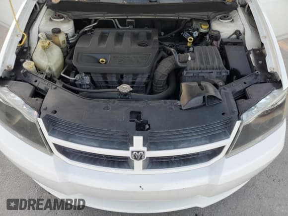 ✅ 2010 Dodge Avenger SXT • VIN: 1B3CC4FB0AN130371 • Лот: 80007124. Опубликован ранее на Copart с пробегом 126 659 миль. Бесплатный доступ к архиву аукционных продаж из США и подробный отчёт об истории автомобиля на DreamBid. Изображение 11.