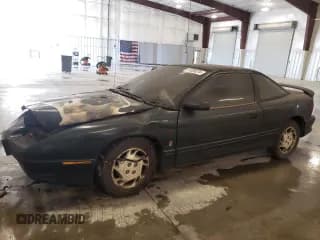 ✅ 1996 Saturn SC • VIN: 1G8ZF1280TZ139117 • Лот: 73220274. Опубликован ранее на Copart с пробегом Не указан. Бесплатный доступ к архиву аукционных продаж из США и подробный отчёт об истории автомобиля на DreamBid. Изображение 1.