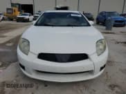 ✅ 2009 Mitsubishi Eclipse GS • VIN: 4A3AK24F19E038830 • Lot: 79469074. Wystawiony na Copart z przebiegiem 69 706 mil. Bezpłatny archiwum sprzedaży aukcyjnych z USA i szczegółowy raport historii pojazdu na DreamBid. Zdjęcie 5.