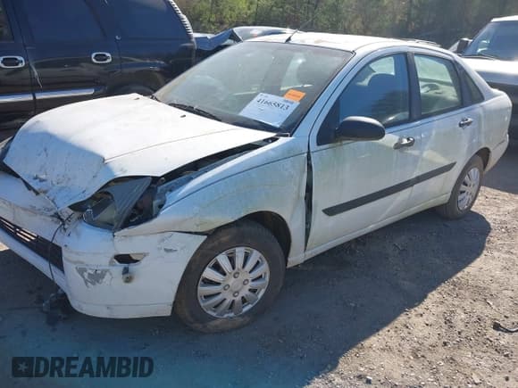 ✅ 2004 Ford Focus LX • VIN: 1FAFP33PX4W201039 • Lot: 41665813. Listed on IAAI with 169,037 mi. Free auction sales archive from the USA and detailed vehicle history report at DreamBid. Image 2.