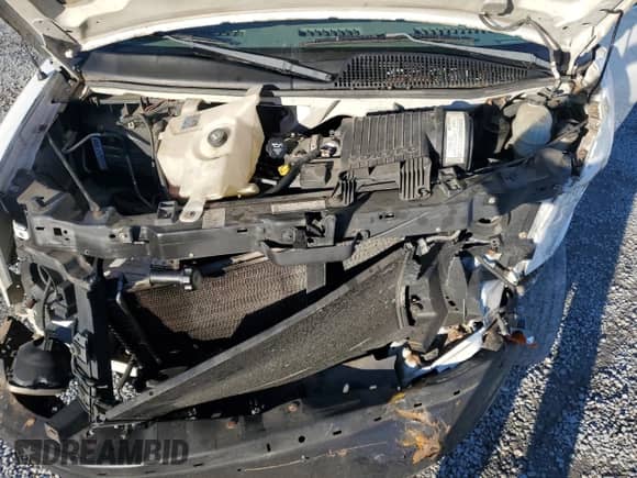 2005 Chevrolet Express Passenger с VIN 1GAGG25V051202535, выставлен на аукционе Copart как лот 86716874 с пробегом 202 331 миль миль и Списание • Salvage title. История ставок и продаж доступна на DreamBid. Изображение 13.