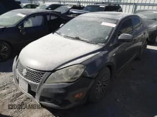✅ 2010 Suzuki Kizashi • VIN: JS2RE9A54A6100694 • Лот: 69668084. Опубликован ранее на Copart с пробегом 106 899 миль. Бесплатный доступ к архиву аукционных продаж из США и подробный отчёт об истории автомобиля на DreamBid. Изображение 1.