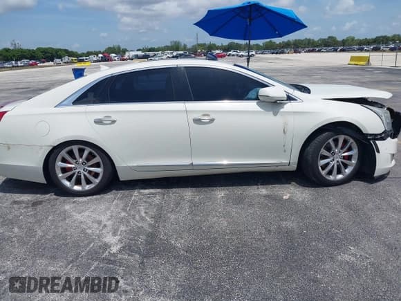 ✅ 2014 Cadillac XTS Luxury • VIN: 2G61M5S33E9326484 • Lot: 43119276. Listed on IAAI with 99,833 mi. Free auction sales archive from the USA and detailed vehicle history report at DreamBid. Image 13.