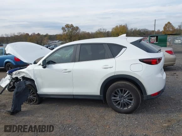 ✅ 2021 Mazda CX-5 Touring • VIN: JM3KFBCM8M0417025 • Lot: 43521796. Wystawiony na IAAI z przebiegiem 44 218 mil. Bezpłatny archiwum sprzedaży aukcyjnych z USA i szczegółowy raport historii pojazdu na DreamBid. Zdjęcie 15.