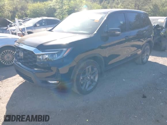 ✅ 2022 Honda Passport EX-L • VIN: 5FNYF7H57NB004890 • Lot: 42032854. Listed on IAAI with 53,642 mi. Free auction sales archive from the USA and detailed vehicle history report at DreamBid. Image 2.