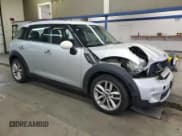 ✅ 2013 MINI Countryman S • VIN: WMWZC3C51DWP22214 • Lot: 93966435. Listed on Copart with 125,664 mi. Free auction sales archive from the USA and detailed vehicle history report at DreamBid. Image 4.