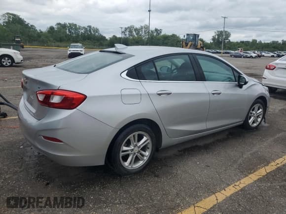 ✅ 2016 Chevrolet Cruze LT • VIN: 1G1BE5SM9G7297321 • Lot: 70029385. Wystawiony na Copart z przebiegiem 135 441 mil. Bezpłatny archiwum sprzedaży aukcyjnych z USA i szczegółowy raport historii pojazdu na DreamBid. Zdjęcie 3.