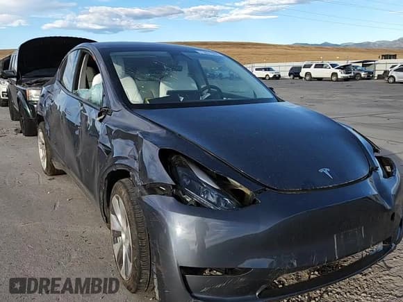 ✅ 2023 Tesla Model Y Long Range • VIN: 7SAYGDEE3PF714262 • Lot: 71861085. Listed on Copart with 13,670 mi. Free auction sales archive from the USA and detailed vehicle history report at DreamBid. Image 14.