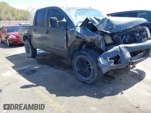 ✅ 2012 Nissan Titan SL • VIN: 1N6BA0EC7CN304116 • Lot: 41950392. Listed on IAAI with 194,352 mi. Free auction sales archive from the USA and detailed vehicle history report at DreamBid. Image 1.