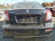 ✅ 2013 Suzuki SX4 LE • VIN: JS2YC5A37D6100928 • Lot: 78411664. Wystawiony na Copart z przebiegiem 78 385 mil. Bezpłatny archiwum sprzedaży aukcyjnych z USA i szczegółowy raport historii pojazdu na DreamBid. Zdjęcie 6.