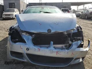 ✅ 2006 BMW M6 • VIN: WBSEH934X6B797896 • Lot: 85962654. Wystawiony na Copart z przebiegiem 97 088 mil. Bezpłatny archiwum sprzedaży aukcyjnych z USA i szczegółowy raport historii pojazdu na DreamBid. Zdjęcie 5.