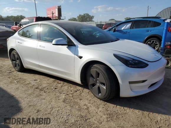 ✅ 2023 Tesla Model 3 • VIN: 5YJ3E1EA2PF587903 • Lot: 81653195. Wystawiony na Copart z przebiegiem 26 067 mil. Bezpłatny archiwum sprzedaży aukcyjnych z USA i szczegółowy raport historii pojazdu na DreamBid. Zdjęcie 4.