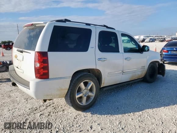 ✅ 2014 Chevrolet Tahoe LTZ • VIN: 1GNSCCE00ER106095 • Lot: 81633235. Listed on Copart with 311,501 mi. Free auction sales archive from the USA and detailed vehicle history report at DreamBid. Image 3.