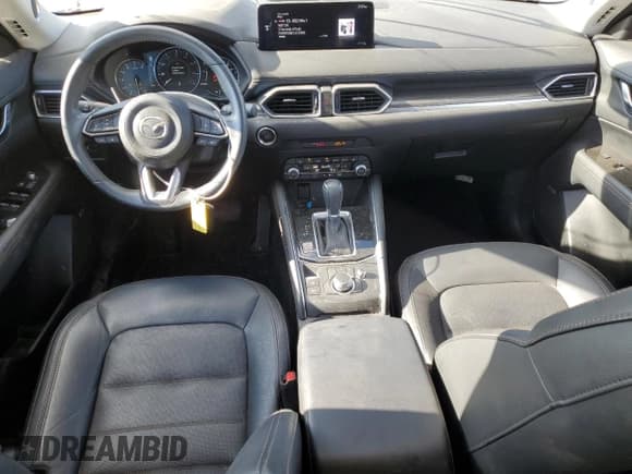 ✅ 2023 Mazda CX-5 S Premium • VIN: JM3KFBDM5P0257480 • Lot: 85570895. Wystawiony na Copart z przebiegiem 31 590 mil. Bezpłatny archiwum sprzedaży aukcyjnych z USA i szczegółowy raport historii pojazdu na DreamBid. Zdjęcie 8.