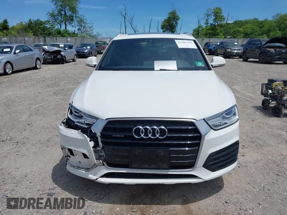 ✅ 2018 Audi Q3 Premium • VIN: WA1ECCFSXJR020965 • Lot: 42301424. Listed on IAAI with 96,583 mi. Free auction sales archive from the USA and detailed vehicle history report at DreamBid. Image 12.