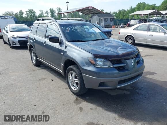 ✅ 2003 Mitsubishi Outlander LS • VIN: JA4LX31G83U090205 • Lot: 42178632. Listed on IAAI with 52,029 mi. Free auction sales archive from the USA and detailed vehicle history report at DreamBid. Image 1.