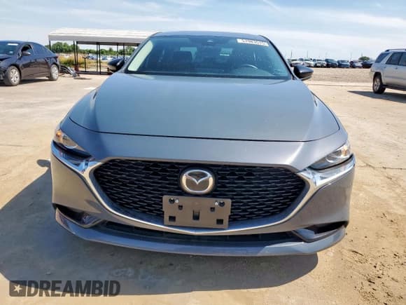 ✅ 2023 Mazda 3 S Carbon Edition • VIN: 3MZBPACM3PM353359 • Lot: 57983515. Wystawiony na Copart z przebiegiem 22 937 mil. Bezpłatny archiwum sprzedaży aukcyjnych z USA i szczegółowy raport historii pojazdu na DreamBid. Zdjęcie 5.