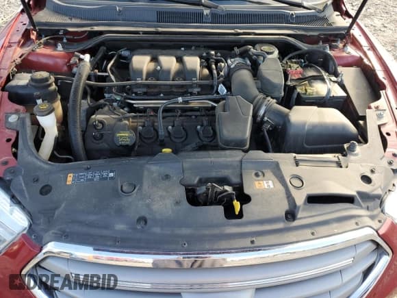 ✅ 2014 Ford Taurus SEL • VIN: 1FAHP2H86EG118885 • Lot: 82683675. Listed on Copart with 109,970 mi. Free auction sales archive from the USA and detailed vehicle history report at DreamBid. Image 11.