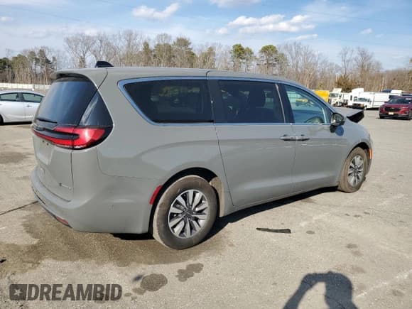 ✅ 2023 Chrysler Pacifica Hybrid Touring L • VIN: 2C4RC1L72PR618529 • Lot: 46994375. Listed on Copart with 59,006 mi. Free auction sales archive from the USA and detailed vehicle history report at DreamBid. Image 3.