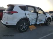 ✅ 2018 Toyota RAV4 XLE • VIN: JTMWFREV2JJ210306 • Лот: 82659905. Опубликован ранее на Copart с пробегом 23 770 миль. Бесплатный доступ к архиву аукционных продаж из США и подробный отчёт об истории автомобиля на DreamBid. Изображение 3.