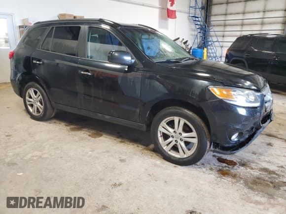 ✅ 2012 Hyundai Santa Fe SE • VIN: 5XYZHDAG0CG127901 • Lot: 63340214. Listed on Copart with 197,402 mi. Free auction sales archive from the USA and detailed vehicle history report at DreamBid. Image 4.