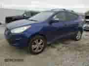 2012 Hyundai Tucson GLS z VIN KM8JUCAC6CU402049, wystawiony jako Copart lot #72261984 z przebiegiem 143 459 mil mil oraz Szkoda całkowita • Salvage title. Historia ofert i sprzedaży dostępna na DreamBid. Obrazek 1.