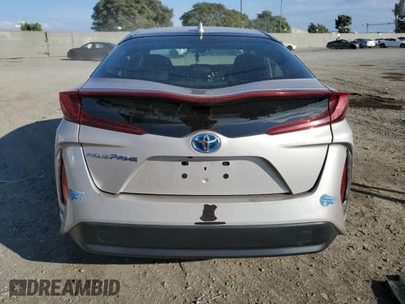 2021 Toyota Prius LE z VIN JTDKAMFP6M3174337, wystawiony jako Copart lot #81413265 z przebiegiem 142 475 mil mil oraz Szkoda całkowita • Salvage title. Historia ofert i sprzedaży dostępna na DreamBid. Obrazek 6.
