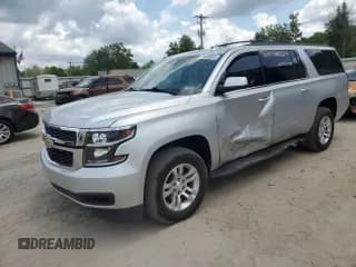 ✅ 2020 Chevrolet Suburban LS • VIN: 1GNSCGKC6LR183119 • Лот: 54466925. Опубликован ранее на Copart с пробегом 87 978 миль. Бесплатный доступ к архиву аукционных продаж из США и подробный отчёт об истории автомобиля на DreamBid. Изображение 1.