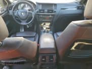 ✅ 2015 BMW X4 xDrive28i • VIN: 5UXXW3C52F0M87926 • Lot: 94218295. Listed on Copart with 94,567 mi. Free auction sales archive from the USA and detailed vehicle history report at DreamBid. Image 8.