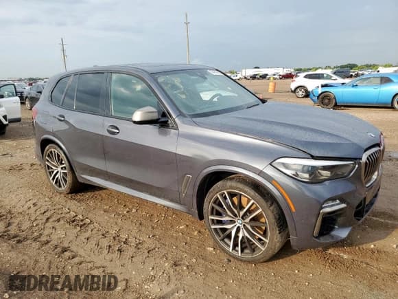 ✅ 2020 BMW X5 M50i • VIN: 5UXJU4C02LLE45615 • Лот: 66461895. Опубликован ранее на Copart с пробегом 38 574 миль. Бесплатный доступ к архиву аукционных продаж из США и подробный отчёт об истории автомобиля на DreamBid. Изображение 4.