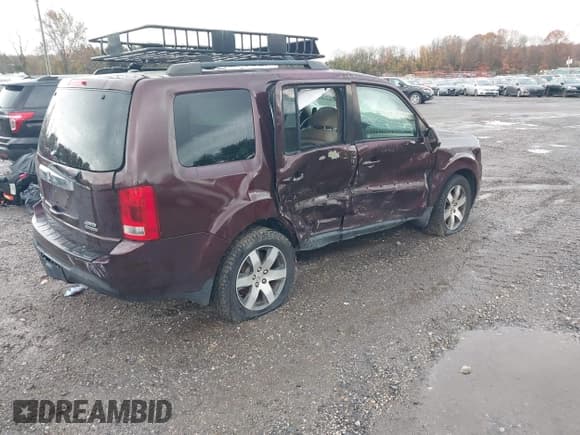 ✅ 2012 Honda Pilot Touring • VIN: 5FNYF4H92CB074814 • Lot: 43655208. Listed on IAAI with 223,305 mi. Free auction sales archive from the USA and detailed vehicle history report at DreamBid. Image 4.
