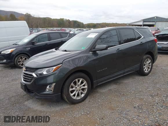 2018 Chevrolet Equinox LT with VIN 2GNAXSEV4J6120741, listed as a IAAI auction lot 43528794 with 71,503 mi miles and . Bid and sale history available at DreamBid. Image 18.