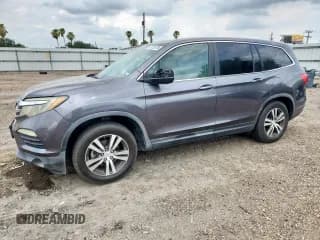 ✅ 2017 Honda Pilot EX-L • VIN: 5FNYF5H88HB013682 • Lot: 59129175. Listed on Copart with 169,461 mi. Free auction sales archive from the USA and detailed vehicle history report at DreamBid. Image 1.