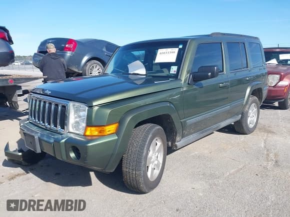 ✅ 2007 Jeep Commander Sport • VIN: 1J8HH48K67C533772 • Lot: 41033399. Listed on IAAI with 295,552 mi. Free auction sales archive from the USA and detailed vehicle history report at DreamBid. Image 2.